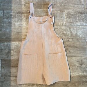 Emery Rose Tan waffle print romper with adjustable straps and two front pockets